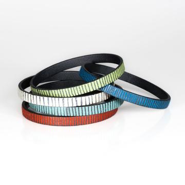 stack of medium width color bangle bracelets by Mary and LouAnn