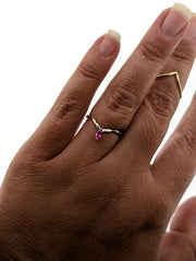 dainty organic pink sapphire arched shadow band stacking ring with marquise shaped stone in two tone band