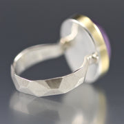 Angled view of back of amethyst chiseled ring.