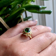 Full view of Etta Ring on woman's hand to help give an idea of its scale.