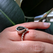 Side view of Gina Ring on woman's hand.