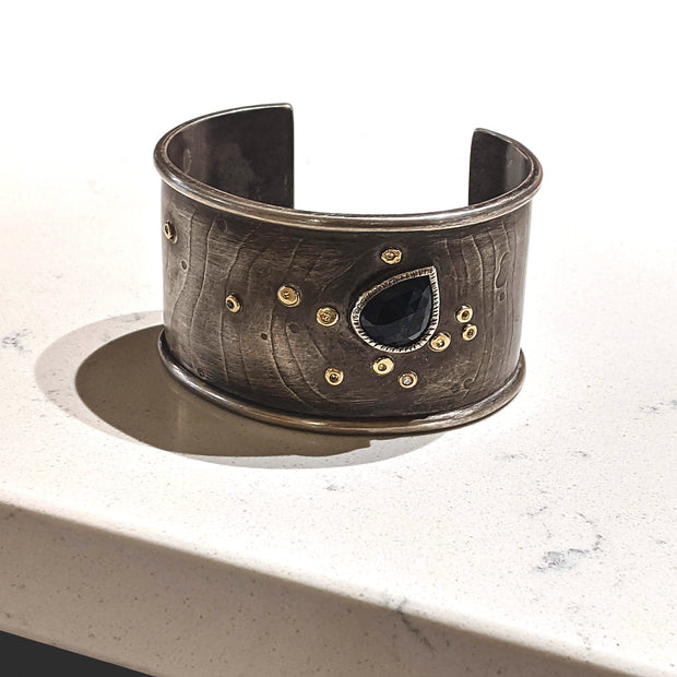 Side view of Sapphire Cuff Bracelet.