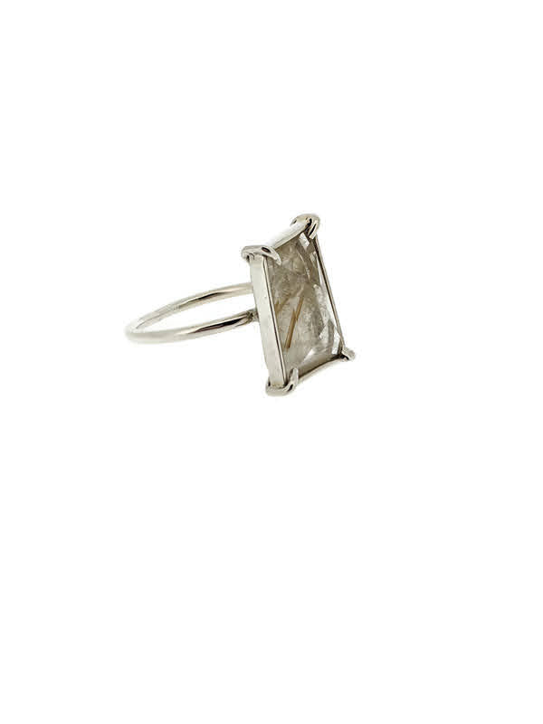 Full image of side of Rectangular Rutilated Quartz Ring. This ring has a set rectangular quartz in silver.