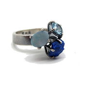 Angled view of side of Triple Blue - Gemstone Ring.