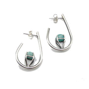 Full view of Amazonite Hoop Earrings. These teardrop hoop earrings showcase a set amazonite in sterling silver.