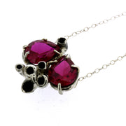 Full view of Ruby necklace. Organic Cluster Necklaces in Sterling Silver with two large teardrop shaped Lab Grown Rubies.  