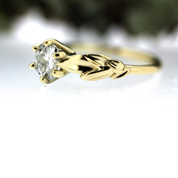 Close up view of side of Aspen Ring. Here the botanical leaves are showcased.