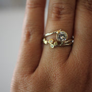 Moissanite and Diamond one of a kind unique engagement ring set, shown on finger