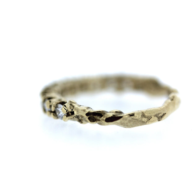 2mm diamond engagement half eternity band with unique organic texture and side viewing, detail shot of texture on band