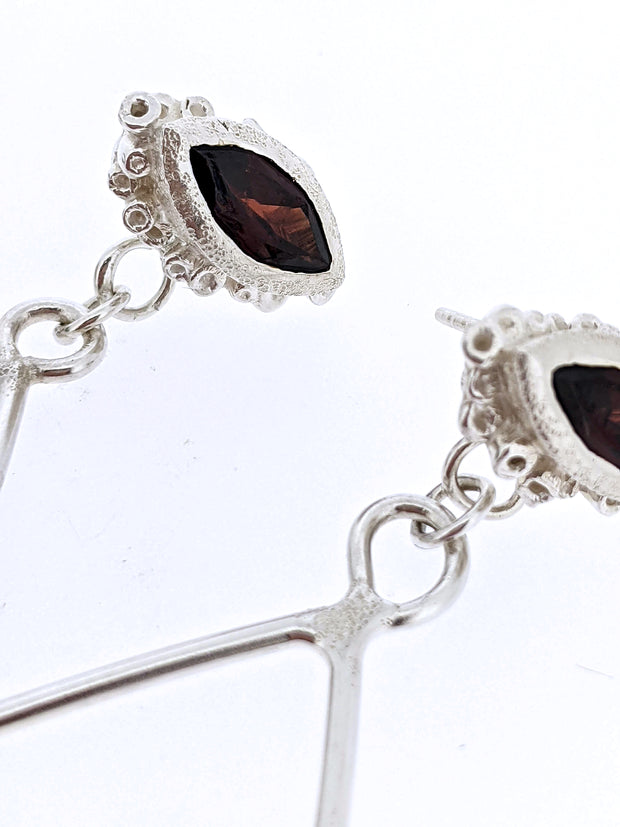 Detail shot of marquise garnets on Trena Earrings.