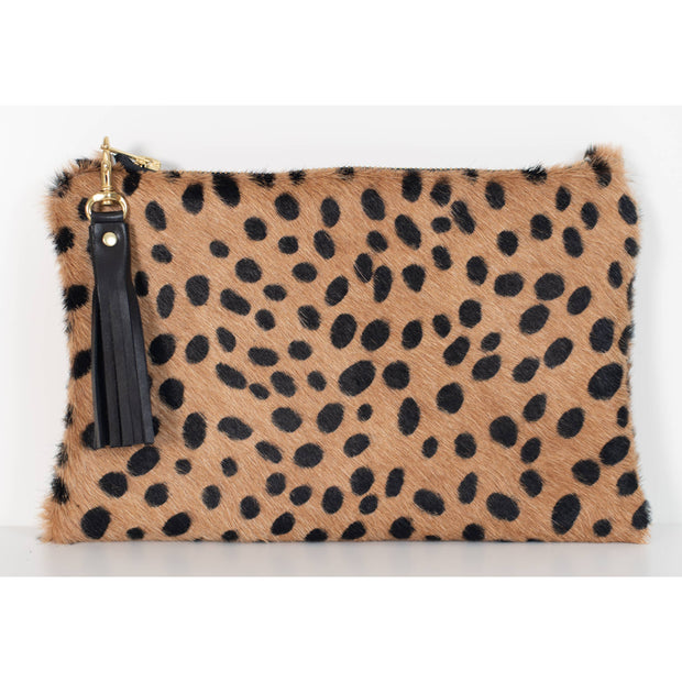 Full image of Charis Clutch with a cheetah print (tan and brown) and a leather accent on the zipper.