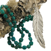 SPUN Feather on Emerald Valley Turquoise Strand
