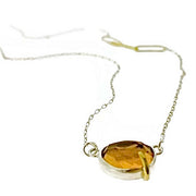 Angled view of pendant on Pebble - Citrine Rose Cut Necklace.