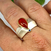 Full view of Carnelian and Sapphire Ring on finger to help give idea of size of ring.