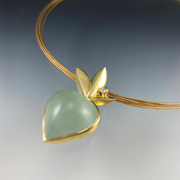 Angled view of pendant on Aquamarine - Bloom Pendant.