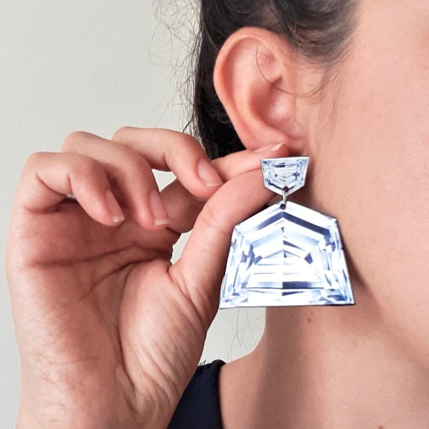 Full view of Shield Shaped Diamond Illustration - Large Drop Earrings being modeled to help give an idea of their scale.