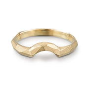 Full image of Contoured facet Ring. This ring is made of gold, showcases an arch and has a facet texture.