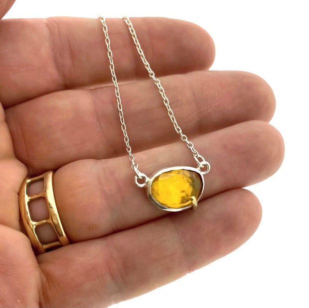 Full view of pendant on Pebble - Citrine Rose Cut Necklace on hand to give idea of scale of piece.