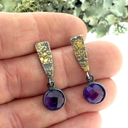 Full view of Fused Wedge Checkerboard Amethyst Drop Earring being held to help give an idea of their scale.