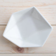 Full image of porcelain ring dish with white finish.