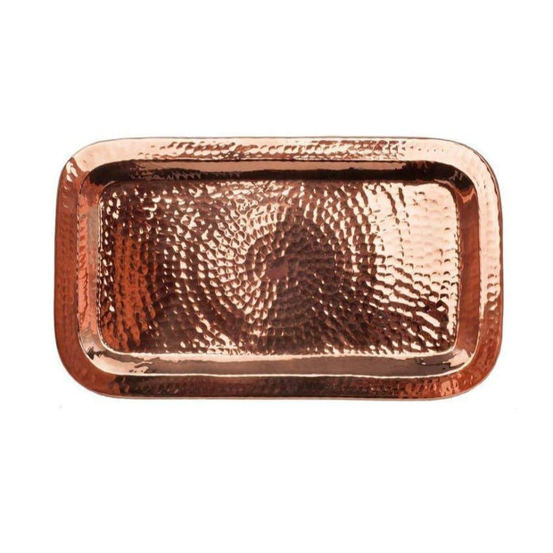 Top view of Copper 12" Tray. This tray is entirely made of copper, is in the shape of a rectangle and has a hammered texture throughout it, creating a circle within a circle within a circle.