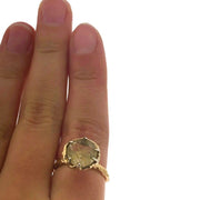Full view of Rutilated Quartz Ring on a woman's finger to help give an idea of its scale.